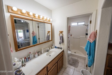 LOVELY 3-BED, 2-BATH HOME IN A GREAT SPOT!! This well-kept on Cerbat Cliffs Golf Course in Arizona - for sale on GolfHomes.com, golf home, golf lot