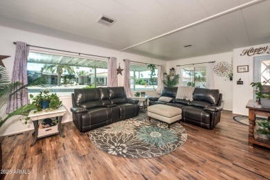 This charming and well-maintained, recently updated 2-bedroom on Fountain of the Sun Country Club in Arizona - for sale on GolfHomes.com, golf home, golf lot
