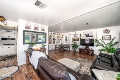 This charming and well-maintained, recently updated 2-bedroom on Fountain of the Sun Country Club in Arizona - for sale on GolfHomes.com, golf home, golf lot