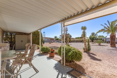 Great curb appeal to this partially furnished split floorplan 2 on Fountain of the Sun Country Club in Arizona - for sale on GolfHomes.com, golf home, golf lot