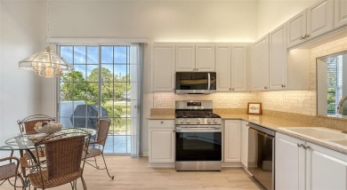 This MOVE-IN READY 2-bedroom, 2-bathroom villa with a den and on University Park Country Club in Florida - for sale on GolfHomes.com, golf home, golf lot