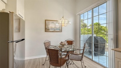 This MOVE-IN READY 2-bedroom, 2-bathroom villa with a den and on University Park Country Club in Florida - for sale on GolfHomes.com, golf home, golf lot
