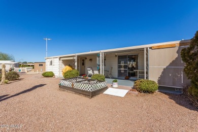 Great curb appeal to this partially furnished split floorplan 2 on Fountain of the Sun Country Club in Arizona - for sale on GolfHomes.com, golf home, golf lot