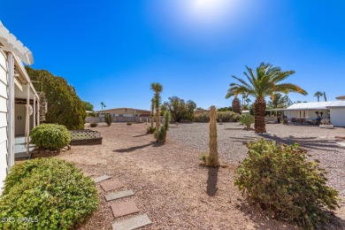 Great curb appeal to this partially furnished split floorplan 2 on Fountain of the Sun Country Club in Arizona - for sale on GolfHomes.com, golf home, golf lot