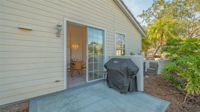 This MOVE-IN READY 2-bedroom, 2-bathroom villa with a den and on University Park Country Club in Florida - for sale on GolfHomes.com, golf home, golf lot