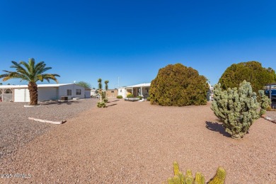 Great curb appeal to this partially furnished split floorplan 2 on Fountain of the Sun Country Club in Arizona - for sale on GolfHomes.com, golf home, golf lot