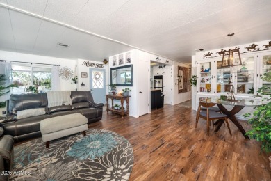 This charming and well-maintained, recently updated 2-bedroom on Fountain of the Sun Country Club in Arizona - for sale on GolfHomes.com, golf home, golf lot
