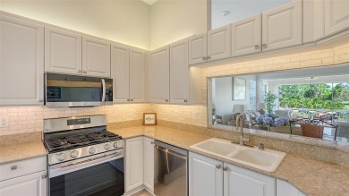 This MOVE-IN READY 2-bedroom, 2-bathroom villa with a den and on University Park Country Club in Florida - for sale on GolfHomes.com, golf home, golf lot