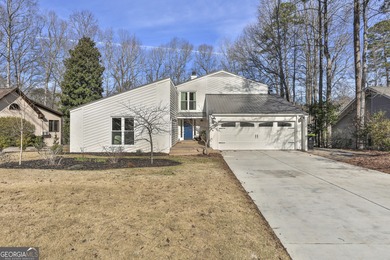 Welcome to this beautifully updated 4-bedroom home perfectly on Canongate At Flat Creek Club in Georgia - for sale on GolfHomes.com, golf home, golf lot