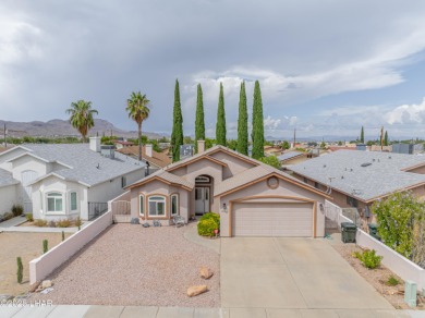 LOVELY 3-BED, 2-BATH HOME IN A GREAT SPOT!! This well-kept on Cerbat Cliffs Golf Course in Arizona - for sale on GolfHomes.com, golf home, golf lot