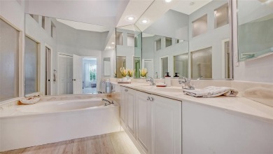 This MOVE-IN READY 2-bedroom, 2-bathroom villa with a den and on University Park Country Club in Florida - for sale on GolfHomes.com, golf home, golf lot