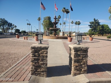 Great curb appeal to this partially furnished split floorplan 2 on Fountain of the Sun Country Club in Arizona - for sale on GolfHomes.com, golf home, golf lot