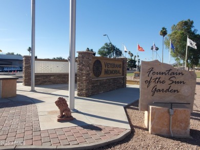 Great curb appeal to this partially furnished split floorplan 2 on Fountain of the Sun Country Club in Arizona - for sale on GolfHomes.com, golf home, golf lot