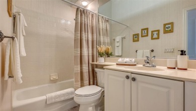This MOVE-IN READY 2-bedroom, 2-bathroom villa with a den and on University Park Country Club in Florida - for sale on GolfHomes.com, golf home, golf lot