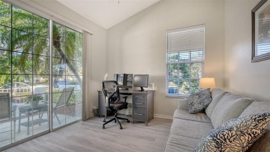 This MOVE-IN READY 2-bedroom, 2-bathroom villa with a den and on University Park Country Club in Florida - for sale on GolfHomes.com, golf home, golf lot