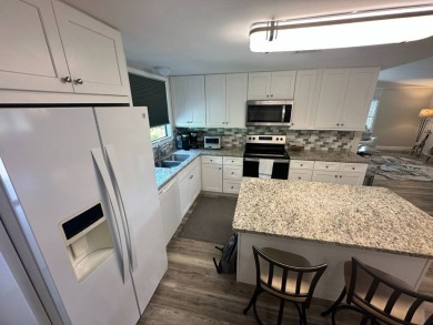 Lot Rent $1342.00    This well cared for 2 bedrooms, 2 bathrooms on Del Tura Golf and Country Club in Florida - for sale on GolfHomes.com, golf home, golf lot