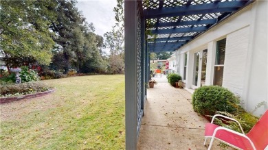 Welcome to this stunning Mid-Century home, a rare find in Yester on Spring Hill College Golf Course in Alabama - for sale on GolfHomes.com, golf home, golf lot