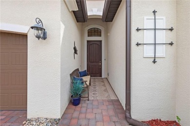This highly desirable Maria model showcases a wide eastern lake on Bonita National Golf Course in Florida - for sale on GolfHomes.com, golf home, golf lot