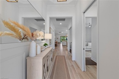 This highly desirable Maria model showcases a wide eastern lake on Bonita National Golf Course in Florida - for sale on GolfHomes.com, golf home, golf lot