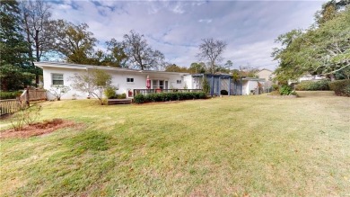 Welcome to this stunning Mid-Century home, a rare find in Yester on Spring Hill College Golf Course in Alabama - for sale on GolfHomes.com, golf home, golf lot