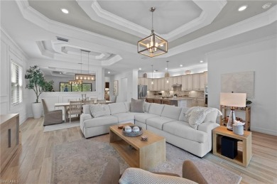 This highly desirable Maria model showcases a wide eastern lake on Bonita National Golf Course in Florida - for sale on GolfHomes.com, golf home, golf lot