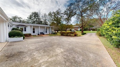 Welcome to this stunning Mid-Century home, a rare find in Yester on Spring Hill College Golf Course in Alabama - for sale on GolfHomes.com, golf home, golf lot