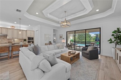 This highly desirable Maria model showcases a wide eastern lake on Bonita National Golf Course in Florida - for sale on GolfHomes.com, golf home, golf lot