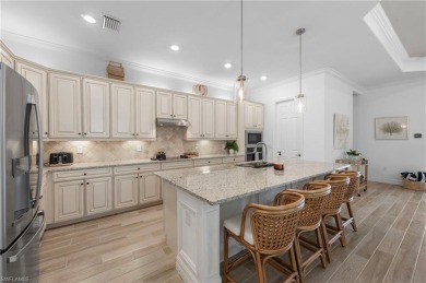 This highly desirable Maria model showcases a wide eastern lake on Bonita National Golf Course in Florida - for sale on GolfHomes.com, golf home, golf lot
