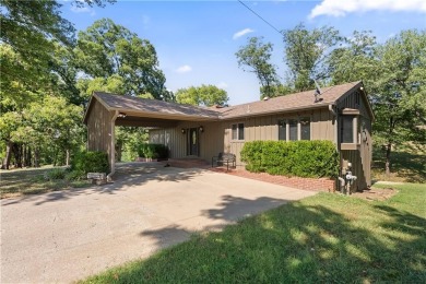 Spacious 4-bedroom, 2-bath home on 1.2 acres overlooking the on Independence Country Club in Kansas - for sale on GolfHomes.com, golf home, golf lot