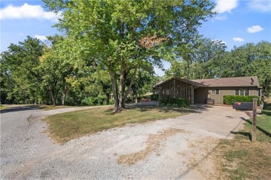 Spacious 4-bedroom, 2-bath home on 1.2 acres overlooking the on Independence Country Club in Kansas - for sale on GolfHomes.com, golf home, golf lot