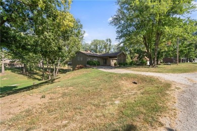 Spacious 4-bedroom, 2-bath home on 1.2 acres overlooking the on Independence Country Club in Kansas - for sale on GolfHomes.com, golf home, golf lot