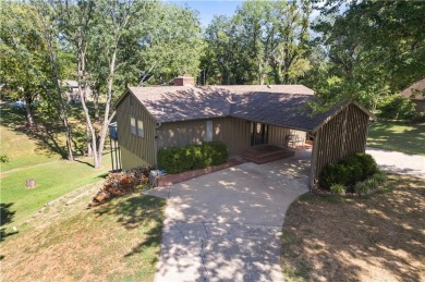 Spacious 4-bedroom, 2-bath home on 1.2 acres overlooking the on Independence Country Club in Kansas - for sale on GolfHomes.com, golf home, golf lot