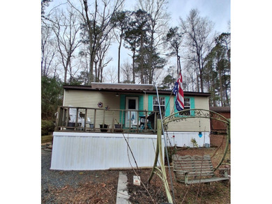 The Perfect coastal retreat in Trails End Seaside Community on Captains Cove Golf and Yacht Club in Virginia - for sale on GolfHomes.com, golf home, golf lot