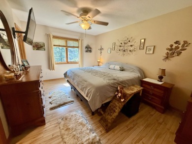 Lovely 4 bedroom 2 bath home built in 2000. Home features an on Michaywe Pines Course in Michigan - for sale on GolfHomes.com, golf home, golf lot