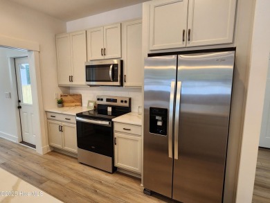 The Dawson plan is a charming 3-bedroom, 2-bathroom cottage that on The Carolina Club in North Carolina - for sale on GolfHomes.com, golf home, golf lot