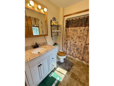 Lovely 4 bedroom 2 bath home built in 2000. Home features an on Michaywe Pines Course in Michigan - for sale on GolfHomes.com, golf home, golf lot