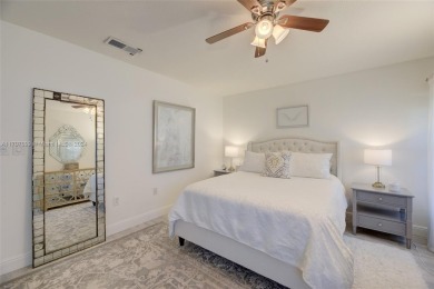 Find paradise in this elegantly updated, bright & airy 2bed on Delray Beach Golf Club in Florida - for sale on GolfHomes.com, golf home, golf lot