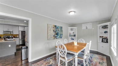 Under contract-accepting backup offers. This 4-bedroom, 2.5-bath on Cleveland Heights Golf Course in Florida - for sale on GolfHomes.com, golf home, golf lot