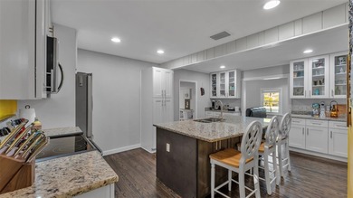 Under contract-accepting backup offers. This 4-bedroom, 2.5-bath on Cleveland Heights Golf Course in Florida - for sale on GolfHomes.com, golf home, golf lot