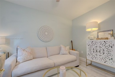 Find paradise in this elegantly updated, bright & airy 2bed on Delray Beach Golf Club in Florida - for sale on GolfHomes.com, golf home, golf lot