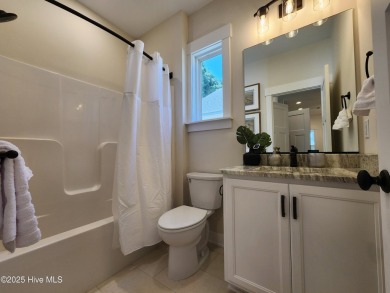 The Dawson plan is a charming 3-bedroom, 2-bathroom cottage that on The Carolina Club in North Carolina - for sale on GolfHomes.com, golf home, golf lot