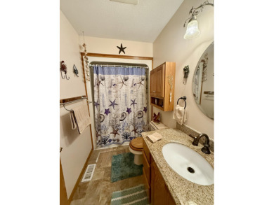 Lovely 4 bedroom 2 bath home built in 2000. Home features an on Michaywe Pines Course in Michigan - for sale on GolfHomes.com, golf home, golf lot