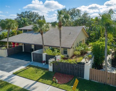 Find paradise in this elegantly updated, bright & airy 2bed on Delray Beach Golf Club in Florida - for sale on GolfHomes.com, golf home, golf lot