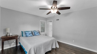 Under contract-accepting backup offers. This 4-bedroom, 2.5-bath on Cleveland Heights Golf Course in Florida - for sale on GolfHomes.com, golf home, golf lot