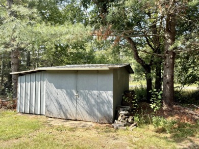 Lovely 4 bedroom 2 bath home built in 2000. Home features an on Michaywe Pines Course in Michigan - for sale on GolfHomes.com, golf home, golf lot