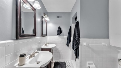 Under contract-accepting backup offers. This 4-bedroom, 2.5-bath on Cleveland Heights Golf Course in Florida - for sale on GolfHomes.com, golf home, golf lot