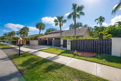 Find paradise in this elegantly updated, bright & airy 2bed on Delray Beach Golf Club in Florida - for sale on GolfHomes.com, golf home, golf lot