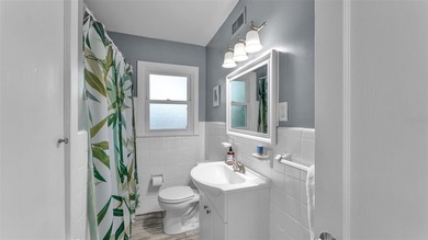 Under contract-accepting backup offers. This 4-bedroom, 2.5-bath on Cleveland Heights Golf Course in Florida - for sale on GolfHomes.com, golf home, golf lot