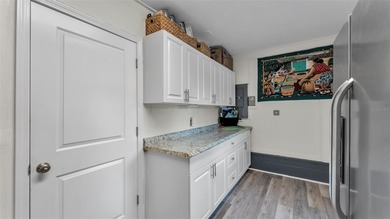 Under contract-accepting backup offers. This 4-bedroom, 2.5-bath on Cleveland Heights Golf Course in Florida - for sale on GolfHomes.com, golf home, golf lot