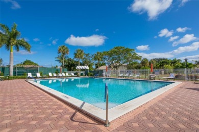 Find paradise in this elegantly updated, bright & airy 2bed on Delray Beach Golf Club in Florida - for sale on GolfHomes.com, golf home, golf lot